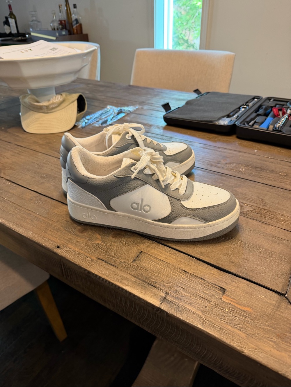 ALO Yoga Men’s Low-Top Sneakers in White and Gray